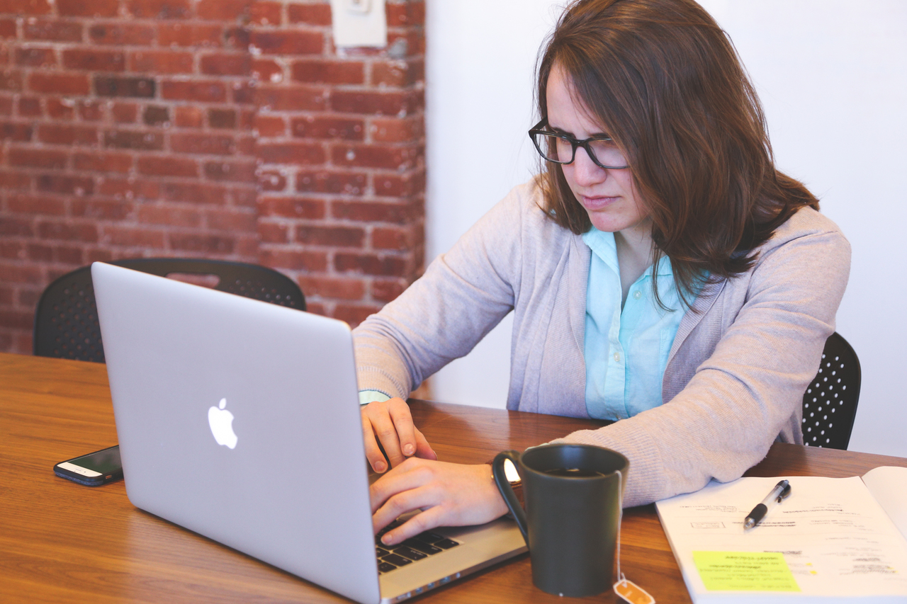 a lady with her laptop GRE Prep